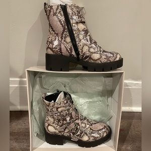 bp cream and brown snake print Womens booties. Compliments and garment well.